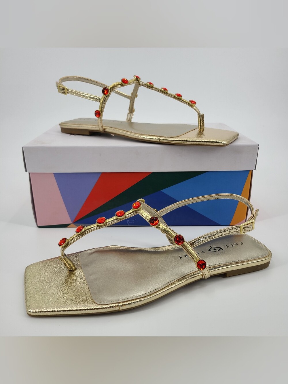 Katy Perry Collections Gold T-Strap Sandals with Red Gem Accents Size 10